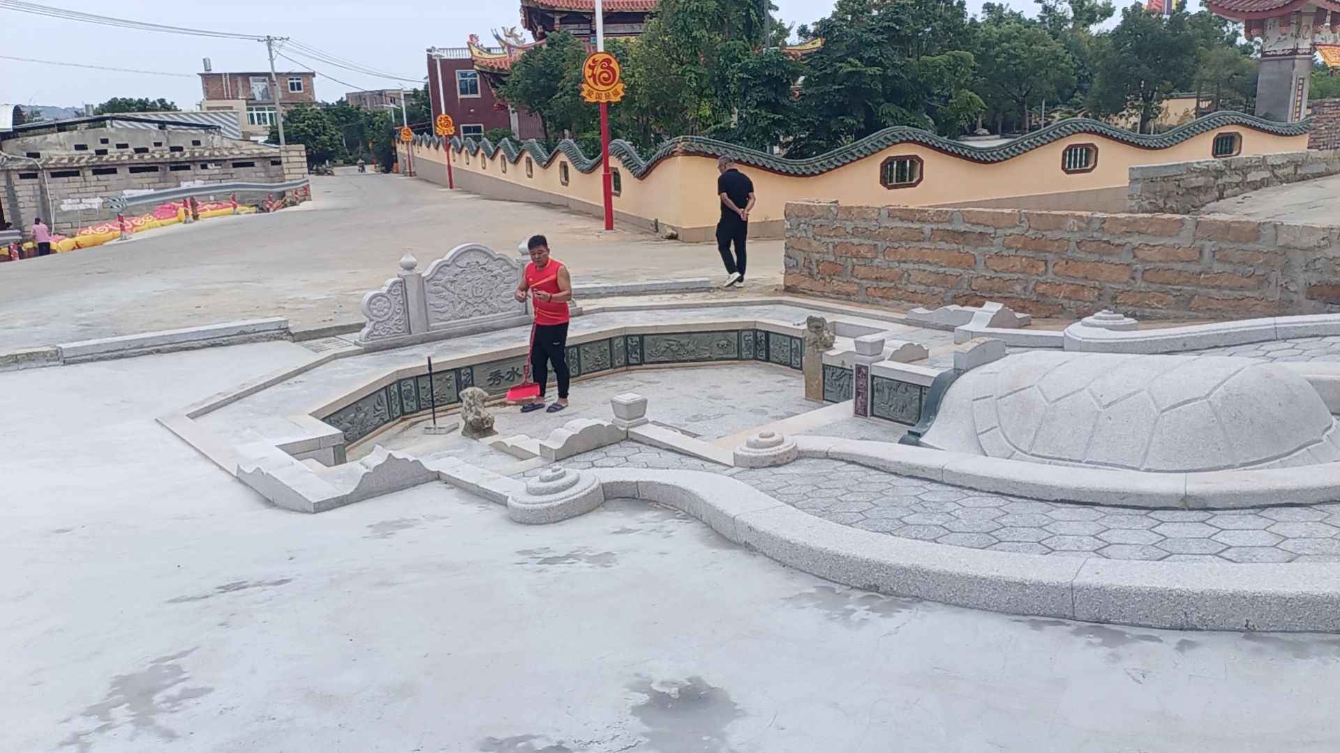 Photo of a Turtle-back Tombstone in a Little Village in China